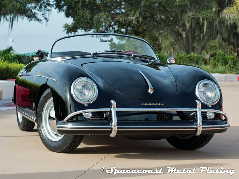 Antique Porsche Roadster, Black. Chrome plated bumpers and guards, headlight trim gings, turn signal and horn grilles, hood trim, body and rocker panel trim, mirrors and window trim.
