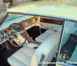 Interior of a 1964 Buick Riviera dashboard and steering wheel displays Spacecoast plating's carefully crafted metal restoration and chrome plating.