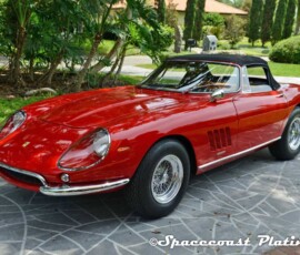 Ferrari red convertible, trim, bumpers, mirrors, headlight trim and wheel rings restored and plated at Spacecoast Plating in Melbourne FL