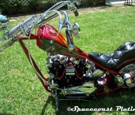 This 2000s custom-built "one-off" chopper motorcycle features chrome plating done by Spacecoast Plating, known for detailed custom work.