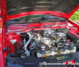 Engine bay displaying custom chrome plated engine components in a Ford Mustang - spacecoast-plating.com