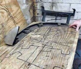 Corvette bumper being restored on template board prior to plating.