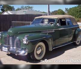 Bumper, grille, headlight surrounds, wheel rings and hubcaps, body trim and accessories restored and chrome plated on this green 1941 Buick convertible.